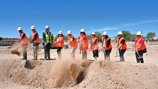 Community leaders – including Housing New Mexico Executive Director/CEO Isidoro Hernandez (second from left)