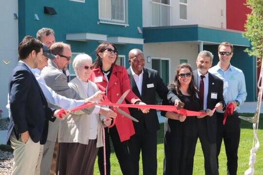 Housing New Mexico Executive Director/CEO Isidoro Hernandez (second from right) participated in the ribbon-cutting ceremony.