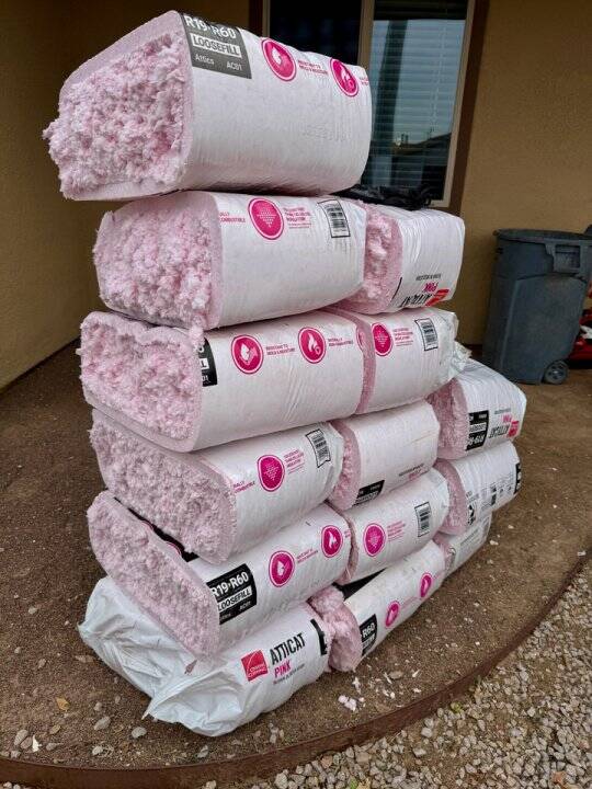 Attendees learned about energy efficient retrofits performed at Loma Del Norte Apartments, including attic insulation.