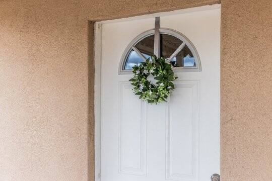 The home's welcoming door.