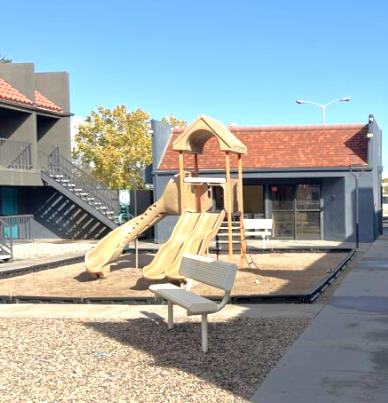 The playground at Las Brisas Apartments was made possible by the New Mexico Preservation Loan Fund.
