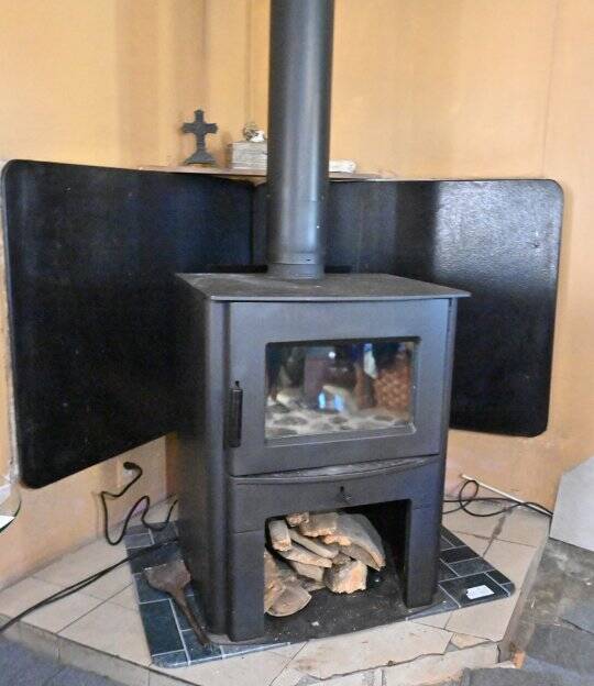 A woodstove retrofit was one of the many energy efficient measures performed at the home.