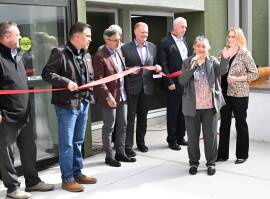 A resident of the community provided remarks and took part in the ribbon-cutting ceremony of Encino Gardens Apartments.
