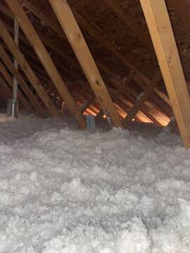 Insulation is onThis insulation project was made possible by the NM Energy$mart Weatherization Program.