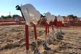 Housing New Mexico representatives and various partners gathered for the Route 66 Flats groundbreaking ceremony on Aug. 7.