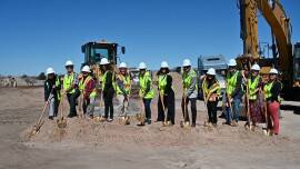 MFA Housing Development Supervisor Tim Martinez (fifth from right) attended the Three Sisters Apartments groundbreaking Feb. 22.