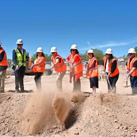 Community leaders – including Housing New Mexico Executive Director/CEO Isidoro Hernandez (second from left)