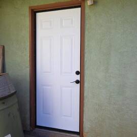New Mexico Mortgage Finance Authority’s NM Energy$mart Weatherization Program funded projects at a home, including a new door.
