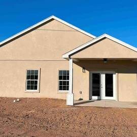 This is a view of the back of an existing home in the El Toro Community subdivision in Roswell.