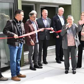 A resident of the community provided remarks and took part in the ribbon-cutting ceremony of Encino Gardens Apartments.