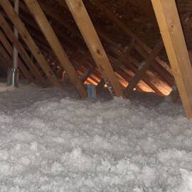 Insulation is onThis insulation project was made possible by the NM Energy$mart Weatherization Program.