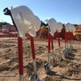 Housing New Mexico representatives and various partners gathered for the Route 66 Flats groundbreaking ceremony on Aug. 7.