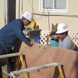 MFA working to weatherize a home